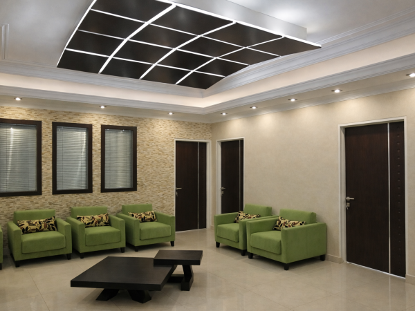 Doctor office waiting room renovation with custom LED ceiling design, modern seating, and clean medical interior finishes in the GTA